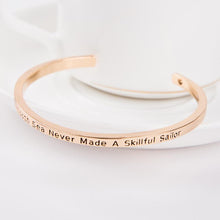 Load image into Gallery viewer, A Smooth Sea Never Made A Skillful Sailor Cuff Bangle
