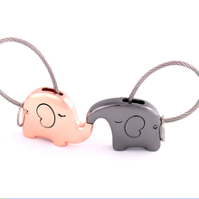 Load image into Gallery viewer, Save The Elephant Love Keychain Set
